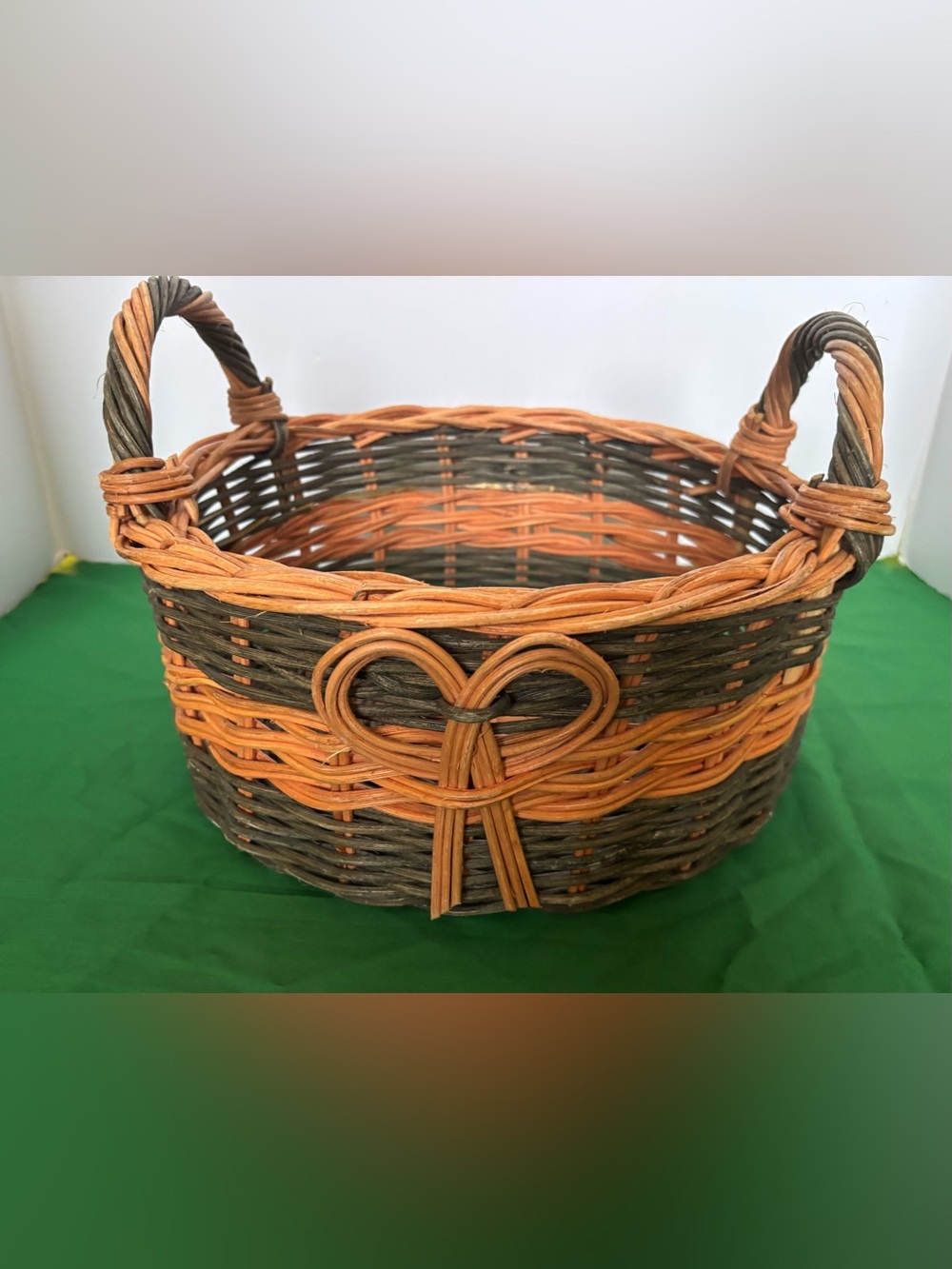 Handwoven Orange & Dark Brown Oval Storage Basket with Bow Accent